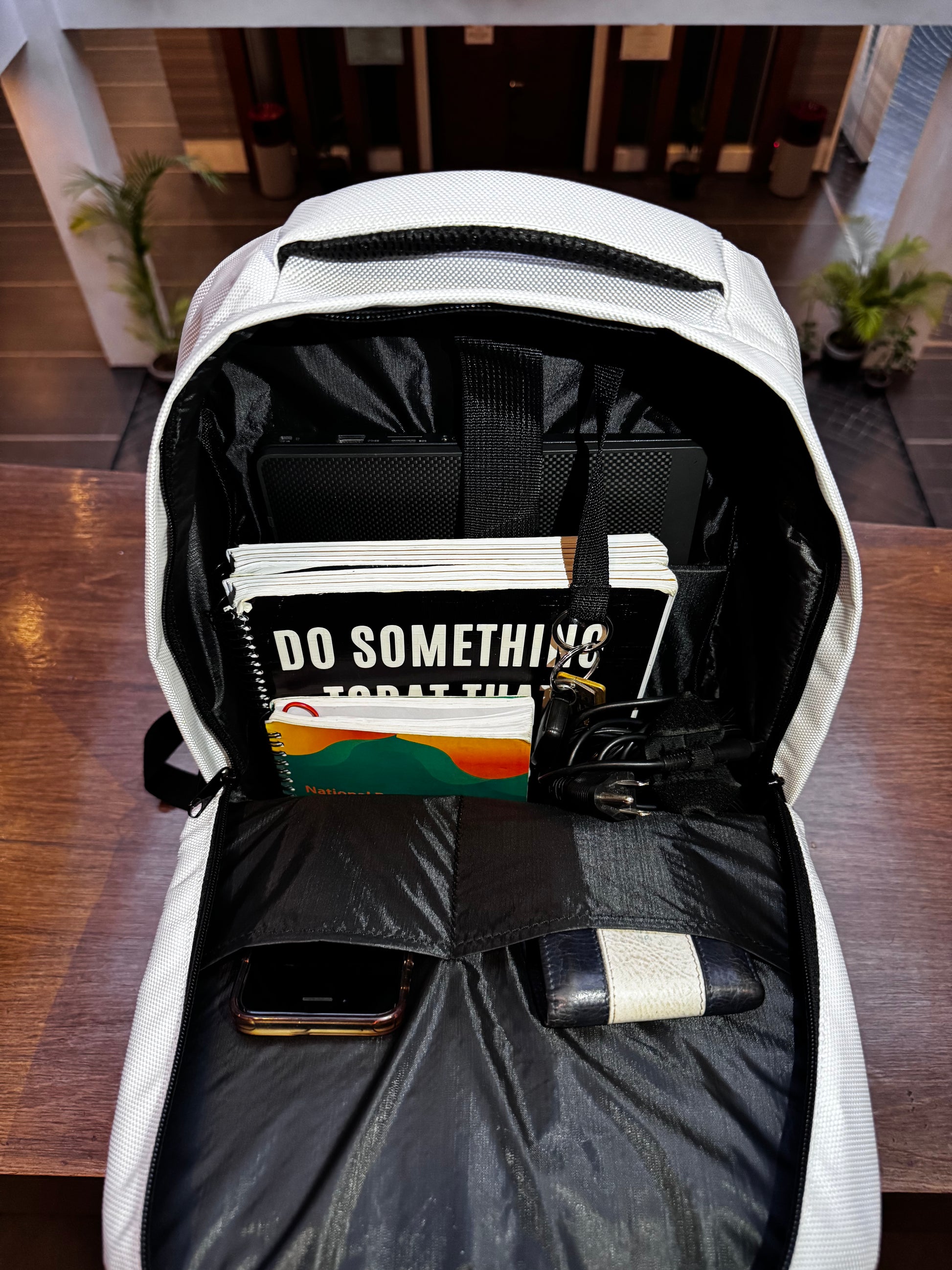 Items inside a Laptop backpack showing the backpacks capacity.